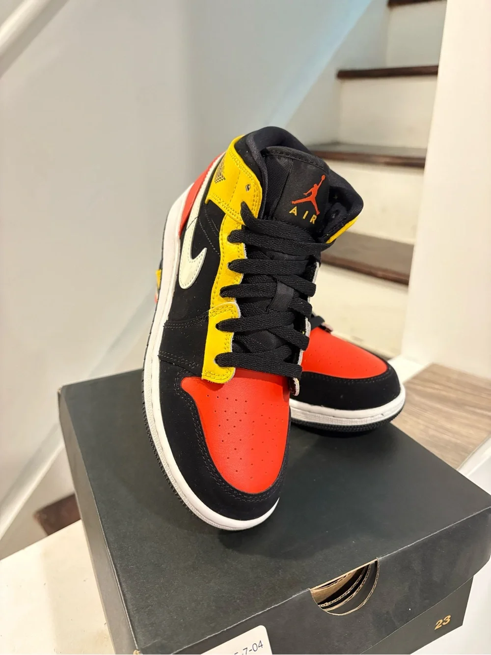 Jordan Air Jordan 1 Mid SE Black/Orange/White Youth Sneaker